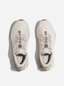 HOKA Women's Transport Sneaker -Fashion Clothing Shop 1123154xEGGNOGEGGNOGxAlt1 90351394