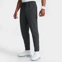 Men's Nike Dri-FIT Unlimited Tapered Leg Versatile Training Pants Black/Black/Black - FB7548 010