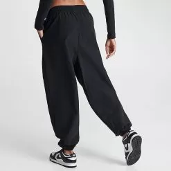 Women's Nike Sportswear Trend Swoosh Woven Jogger Pants Black - FN7700 010 9 Women's Nike Sportswear Trend Swoosh Woven Jogger Pants Black - FN7700 010 -Fashion Clothing Shop FN7700 010 M4